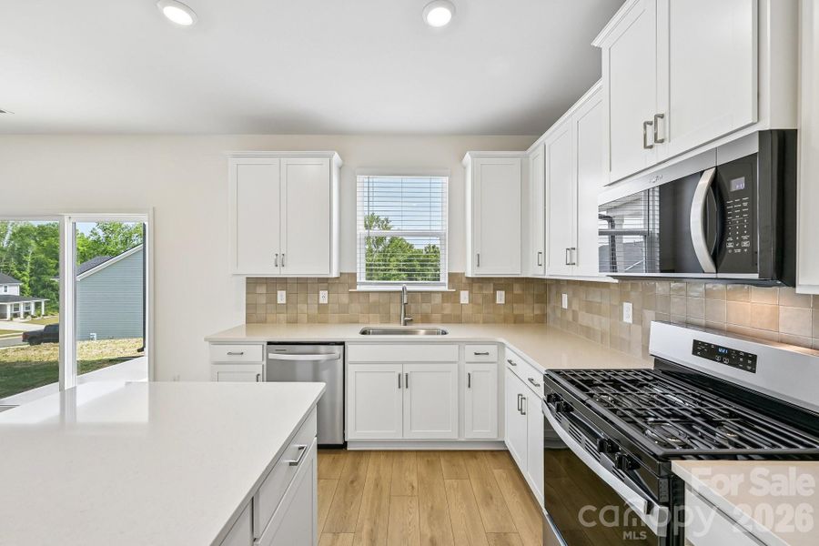 Furnished interior view inside a new home in Bella Vista Heritage, Denver (Image 11).