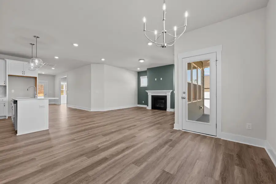 Representative unfurnished interior of a home built from the Raindrops on Roses by Garman Homes in McConnell Ridge, McLeansville (Image 12).