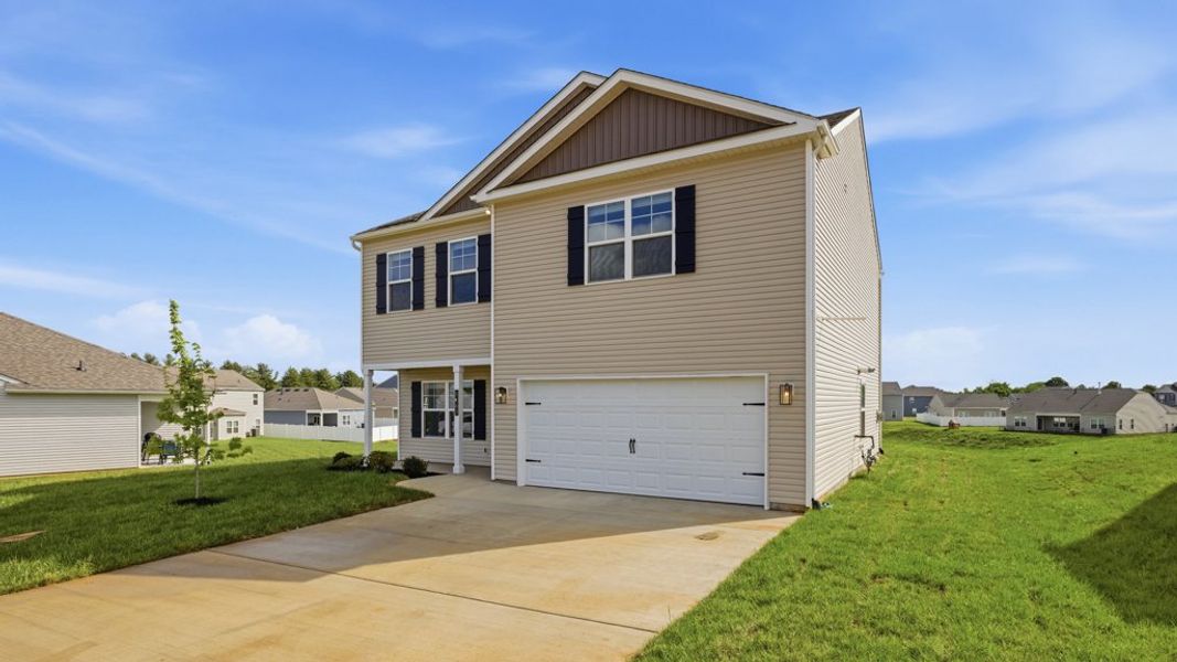 Front exterior of a new home in Millstone Village, Morristown, TN, highlighting curb appeal (Image 2).