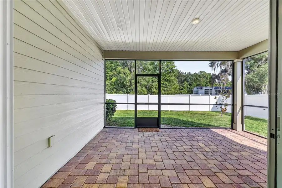 Exterior details and patio area of a home in Heath Preserve, Ocala (Image 27).