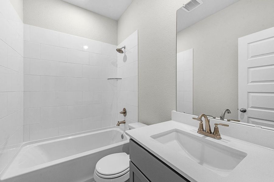 Furnished interior view inside a new home in Lexington Heights, Willis (Image 7).