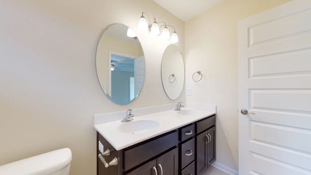 Representative furnished interior of a home built from the Fairfax A by JC Jackson Homes,LLC in Heritage Pointe, Newport (Image 7).