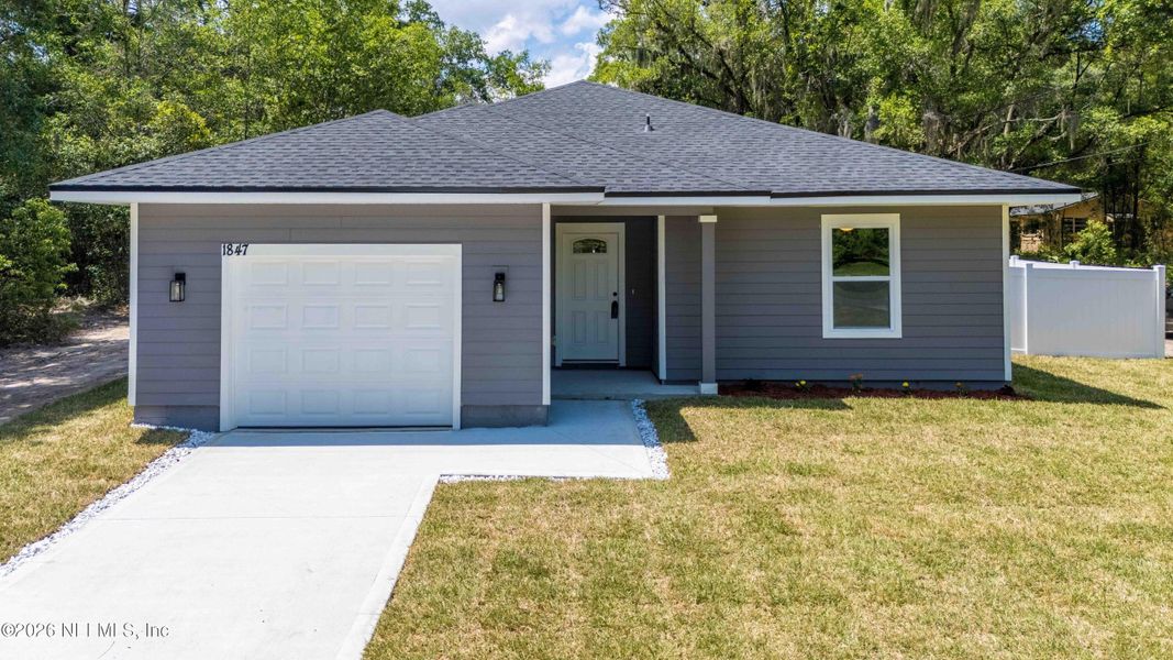 Front exterior of a new home in , Jacksonville, FL, highlighting curb appeal (Image 24).