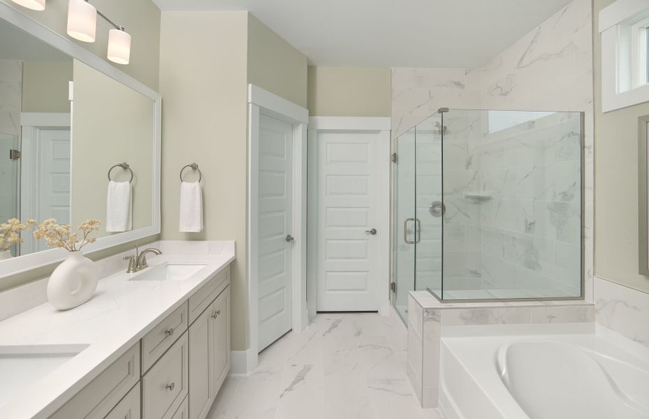 Owner's bath with walk-in shower and glass surround Owner's bath with walk-in shower and glass surround
