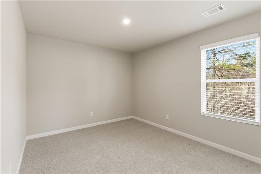 Spacious, unfurnished interior of a new home in The Reserve at Chapel Hill Phase II, Douglasville (Image 18).