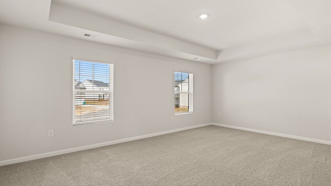 Spacious, unfurnished interior of a new home in The Reserve at Calcutta, Stockbridge (Image 16).