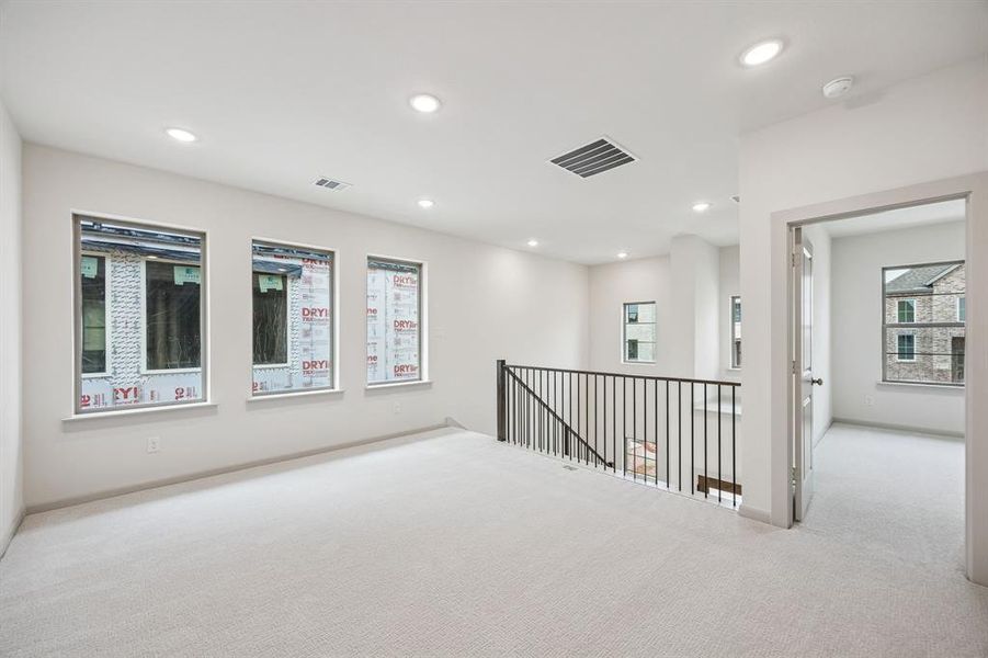 The spacious game room is the ideal spot for play and entertainment.