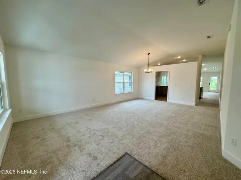 Spacious, unfurnished interior of a new home in Shadow Crest at Rolling Hills, Green Cove Springs (Image 9).