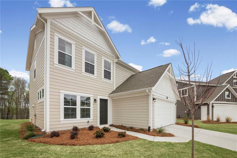 Front exterior of a new home in Sage Woods, Dallas, GA, highlighting curb appeal (Image 19).