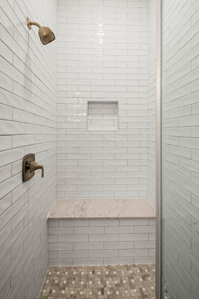 Full bathroom featuring a stall shower