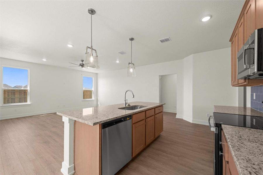 Please Note: These interior photos are not of the actual home but are of a completed one with a simialr floor plan. Finishes, features, and layouts may vary.