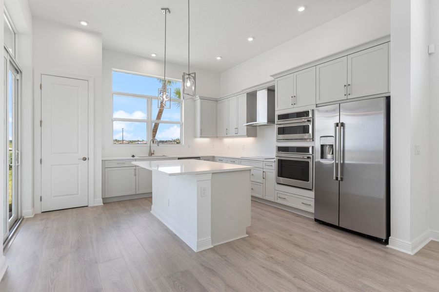 Furnished interior view inside a new home in PGA Village Verano, Port St. Lucie (Image 13).