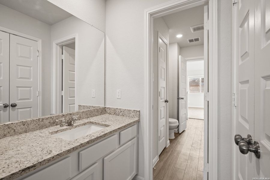 Furnished interior view inside a new home in Cinco Lakes, San Antonio (Image 9).