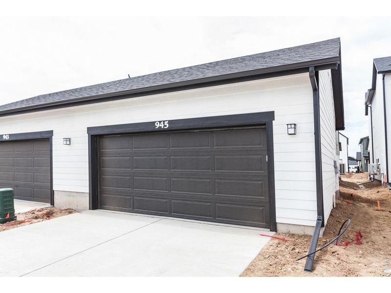 Exterior details and patio area of a home in Prairie Song Story Collection - Single Family Homes, Windsor (Image 24).