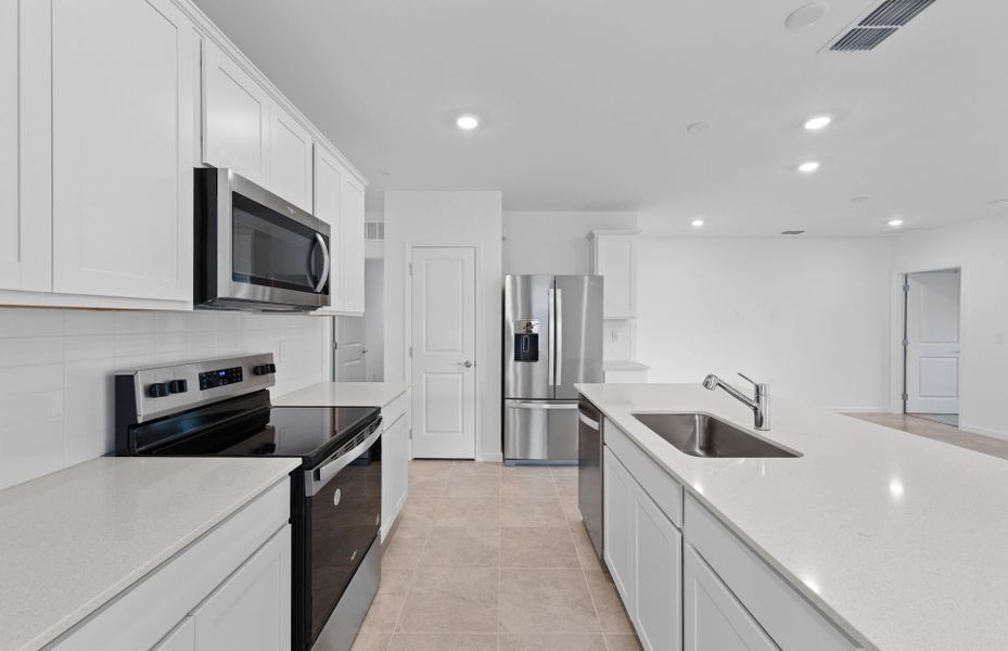 Furnished interior view inside a new home in Caloosa Cove, Labelle (Image 10).