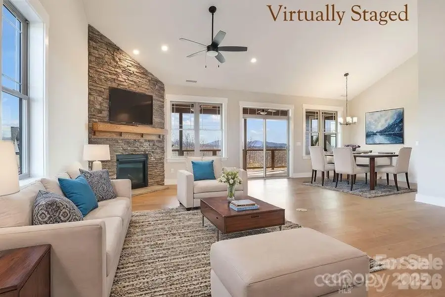Open floorplan with vaulted ceilings, stone gas fireplace. Virtually staged. Similar Model Home. Open floorplan with vaulted ceilings, stone gas fireplace. Virtually staged. Similar Model Home.