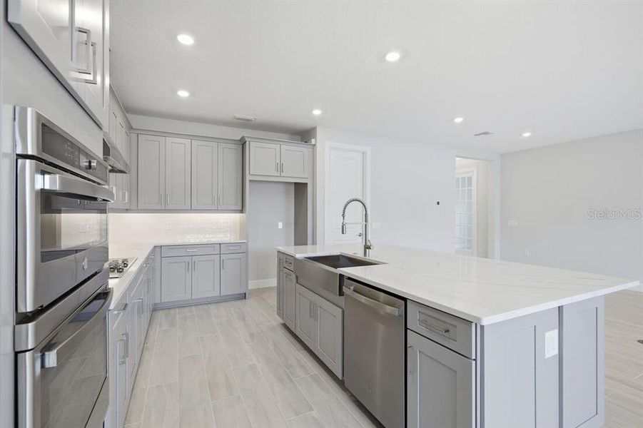 Furnished interior view inside a new home in Esplanade at Westview, Kissimmee (Image 14).