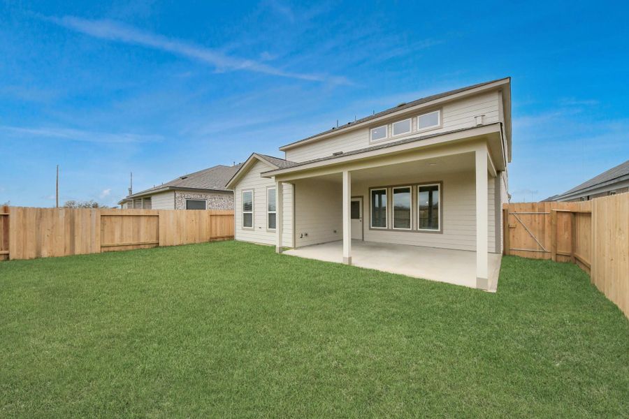 Backyard retreat, offering an abundance of space for kids to play and explore. The possibilities are endless in this outdoor haven, where the joy of open-air activities and family gatherings awaits.