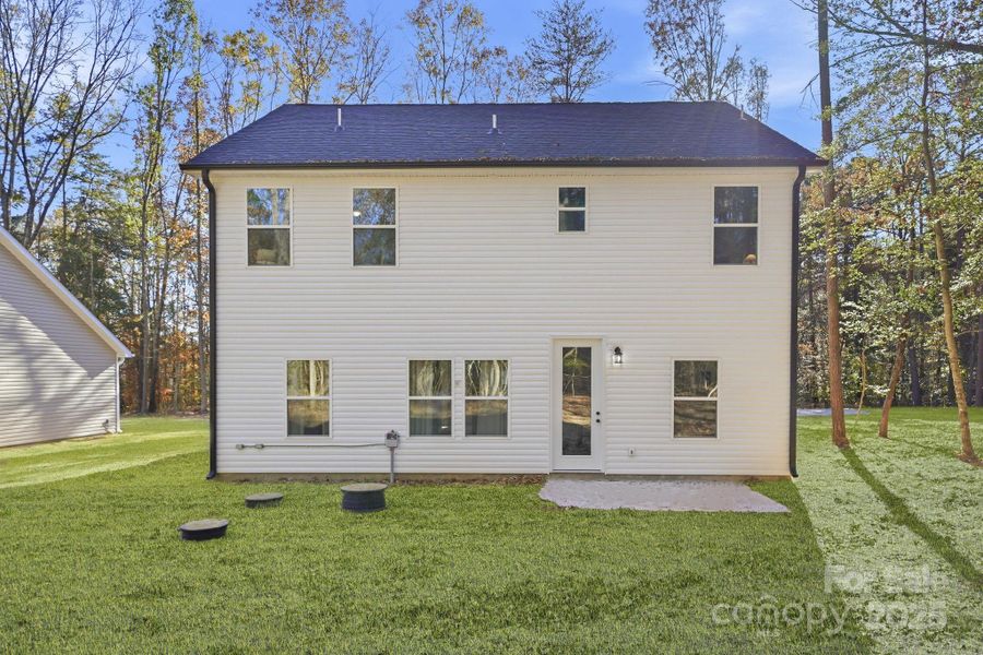 Backyard where acreage awaits!