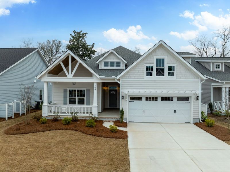 Representative exterior photo of a completed home built from the Kauai by Bill Clark Homes in The Sanctuary at Sunset Beach, Sunset Beach, NC (Image 34).