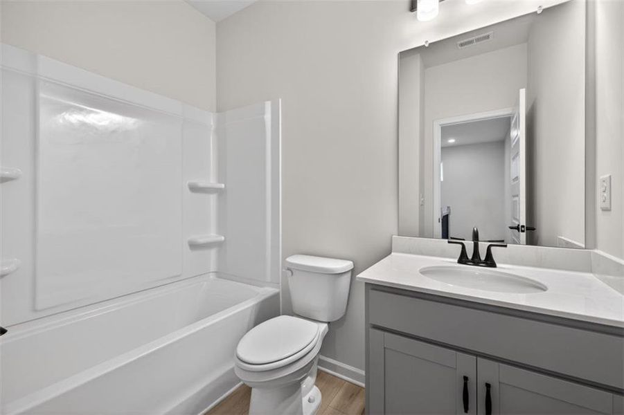 Furnished interior view inside a new home in Sanders Park, Austell (Image 11).