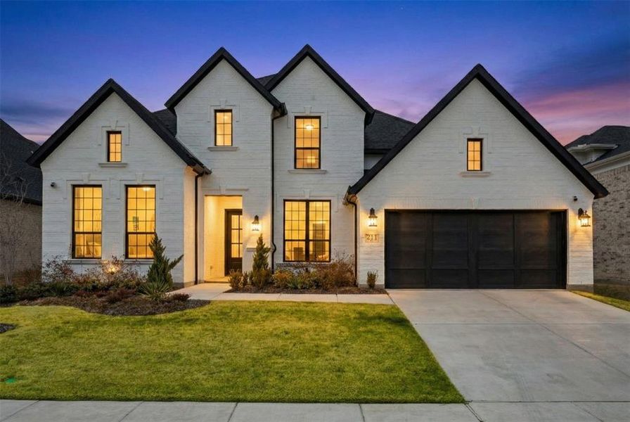Front exterior of a new home in , Wylie, TX, highlighting curb appeal (Image 1). Front exterior of a new home in , Wylie, TX, highlighting curb appeal (Image 1).