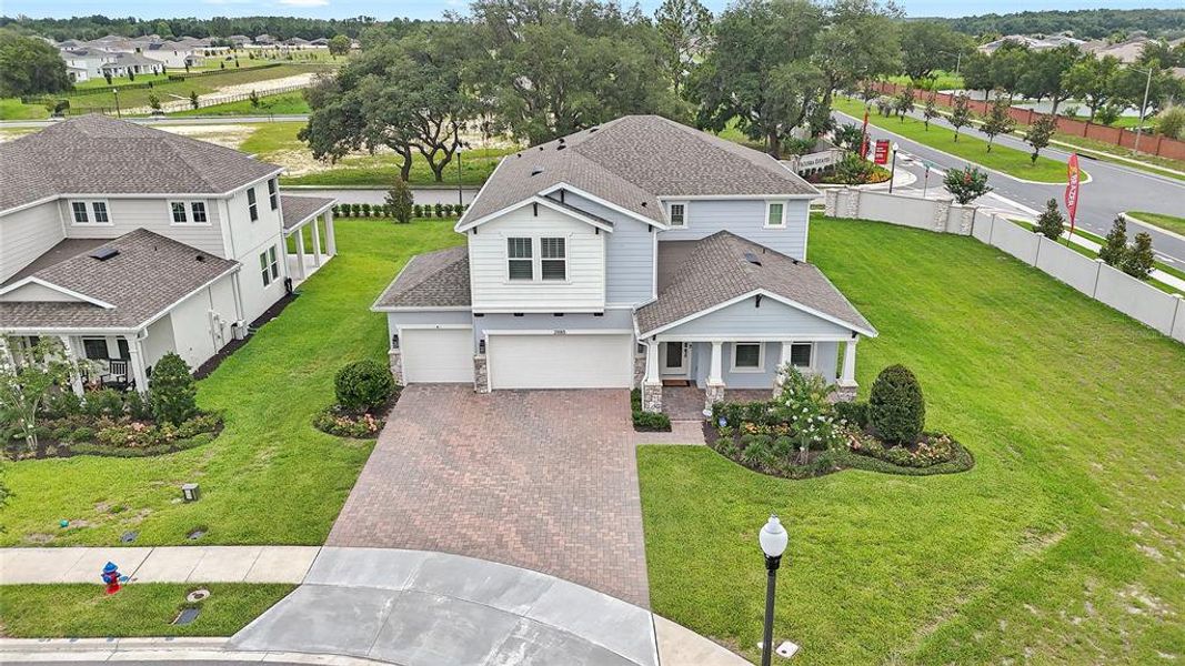 Front exterior of a new home in Acuera Estates, Apopka, FL, highlighting curb appeal (Image 30). Front exterior of a new home in Acuera Estates, Apopka, FL, highlighting curb appeal (Image 30).