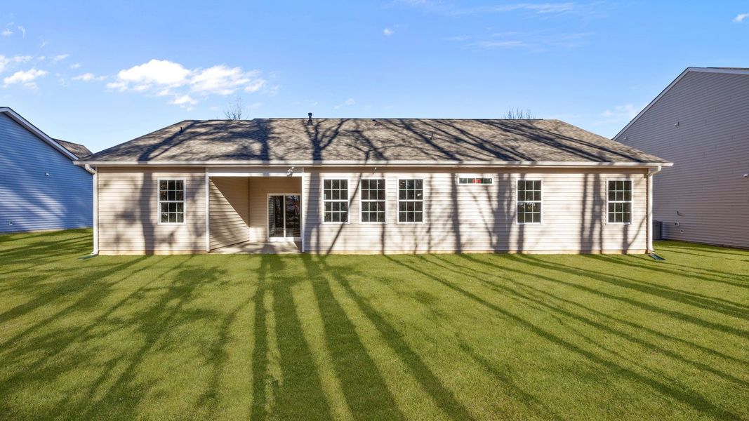 Exterior details and patio area of a home in Tyler - Home on the Lake, New Bern (Image 25).