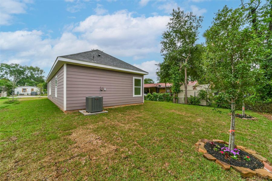 Front exterior of a new home in , Conroe, TX, highlighting curb appeal (Image 21).