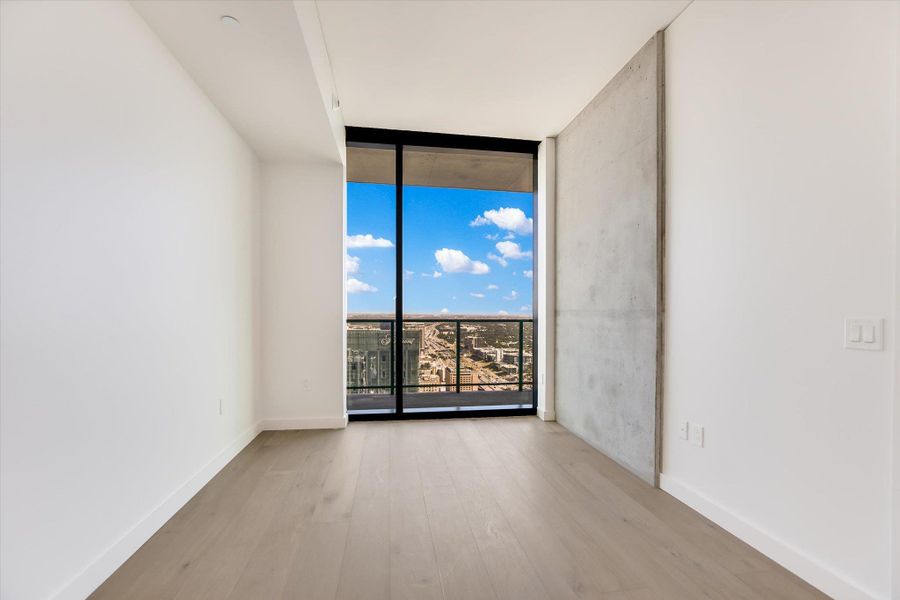 Photos shown are of the same floor plan three floors higher.