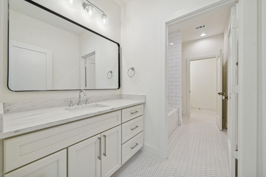 Another view of the hollywood bath from the secondary bedroom at the back of the house. Another view of the hollywood bath from the secondary bedroom at the back of the house.