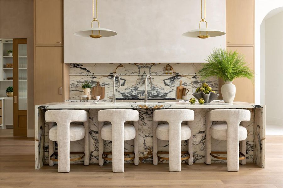 Designed for both function and beauty, the gourmet kitchen features custom white oak cabinetry. Designed for both function and beauty, the gourmet kitchen features custom white oak cabinetry.