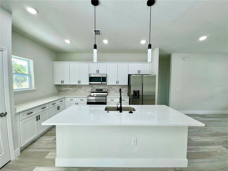 Furnished interior view inside a new home in , Dunnellon (Image 3).