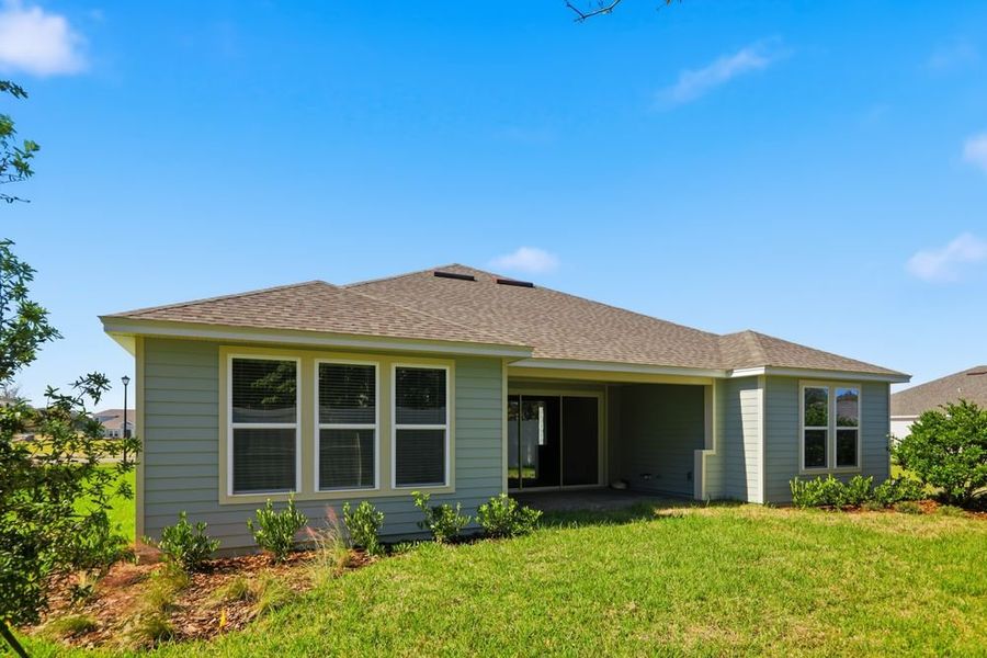 Exterior details and patio area of a home in Headwaters at Lofton Creek, Yulee (Image 3).