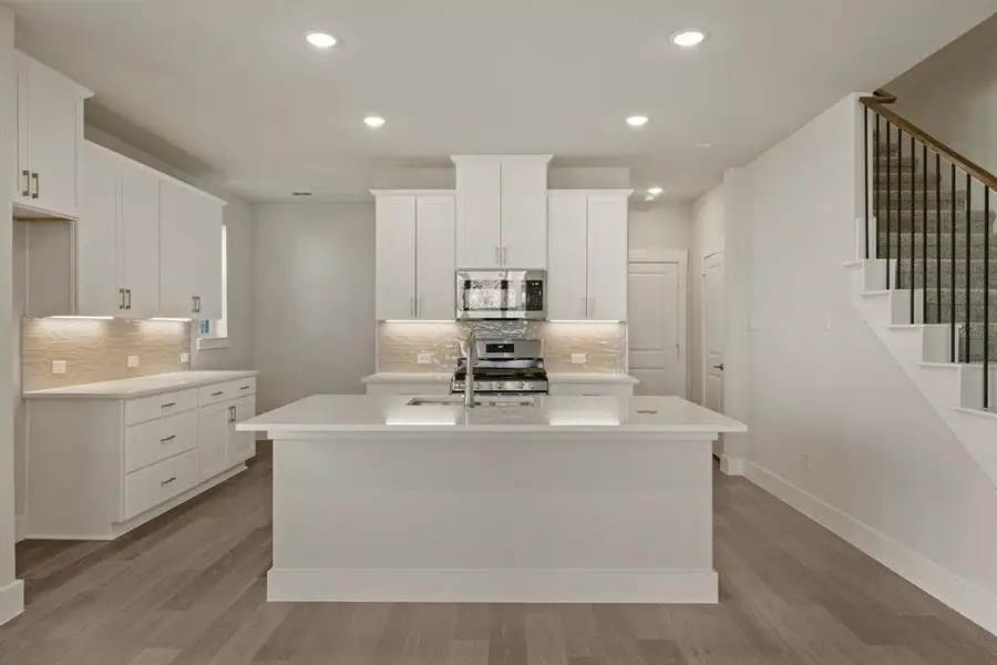 The spacious island is the focal point of your new dream kitchen and the perfect place for friends and family to gather round.