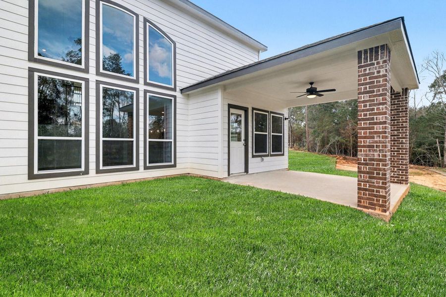 Exterior details and patio area of a home in Oakwood Ranch, Willis (Image 3). Exterior details and patio area of a home in Oakwood Ranch, Willis (Image 3).
