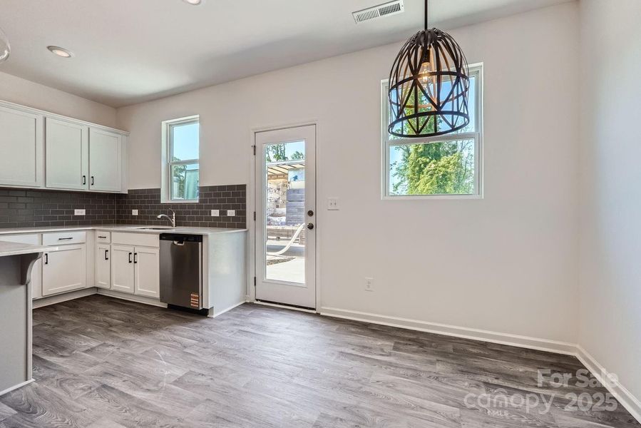 Furnished interior view inside a new home in Dukes Ridge, Charlotte (Image 10).
