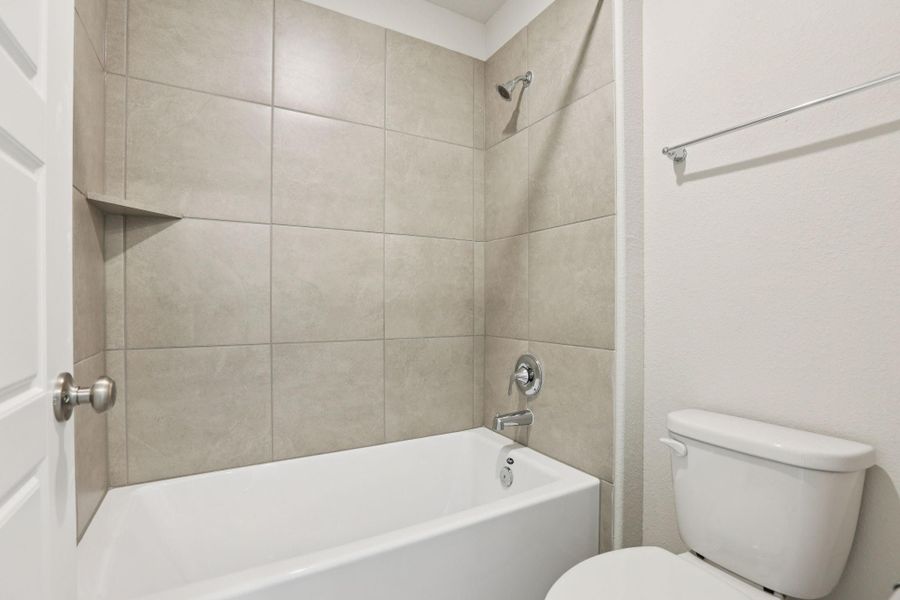 Photos are not of the actual home, but are photos of the builder home with same floorplan with similar interior finishes.