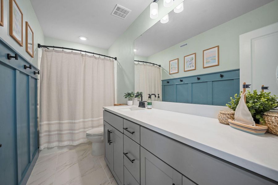 Furnished interior view inside a new home in Jasmine Point at Lakes of Cane Bay, Summerville (Image 41).