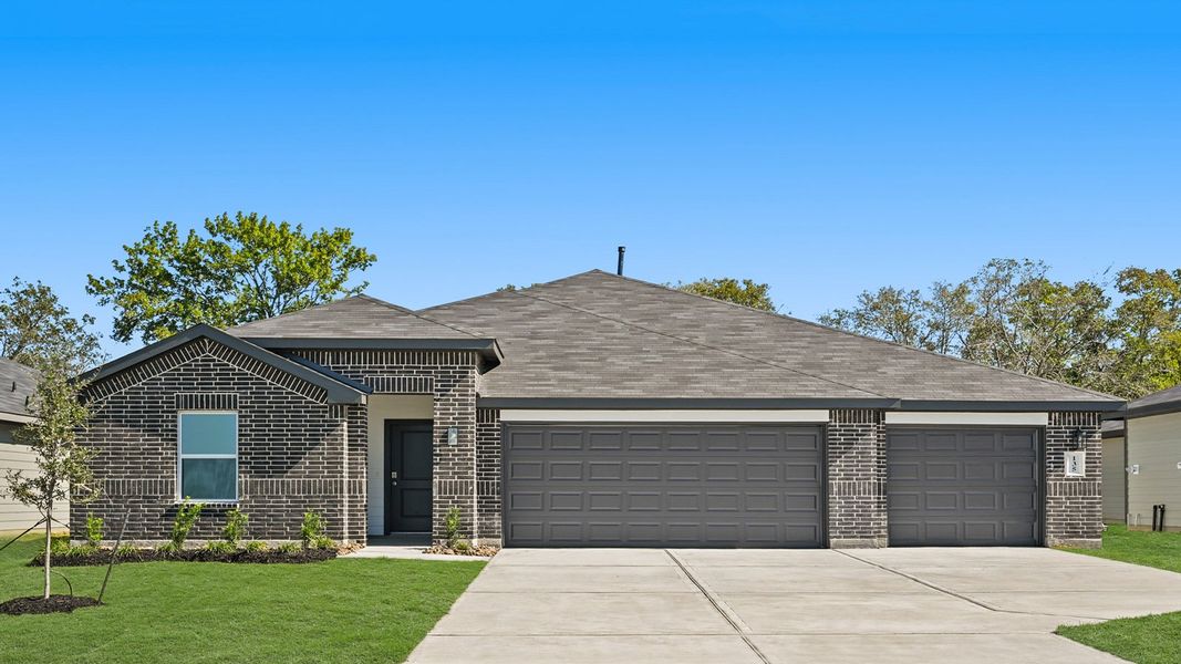 Front exterior of a new home in Medina, Dayton, TX, highlighting curb appeal (Image 1). Front exterior of a new home in Medina, Dayton, TX, highlighting curb appeal (Image 1).