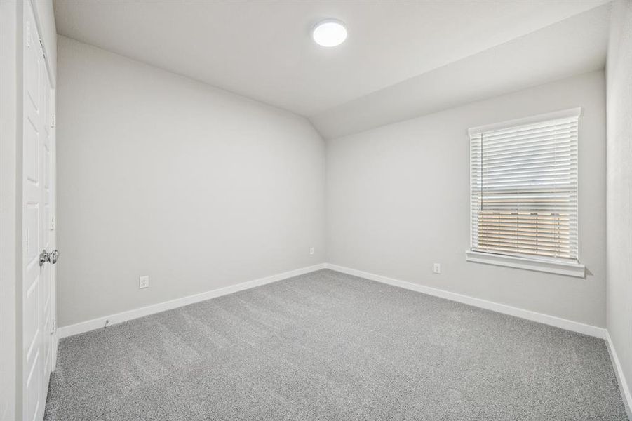 Bedroom in the Oscar home plan by Trophy Signature Homes – REPRESENTATIVE PHOTO Bedroom in the Oscar home plan by Trophy Signature Homes – REPRESENTATIVE PHOTO