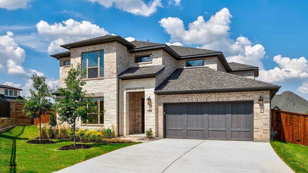 Front exterior of a new home in The Lakes Of Somercrest 60', Midlothian, TX, highlighting curb appeal (Image 2). Front exterior of a new home in The Lakes Of Somercrest 60', Midlothian, TX, highlighting curb appeal (Image 2).