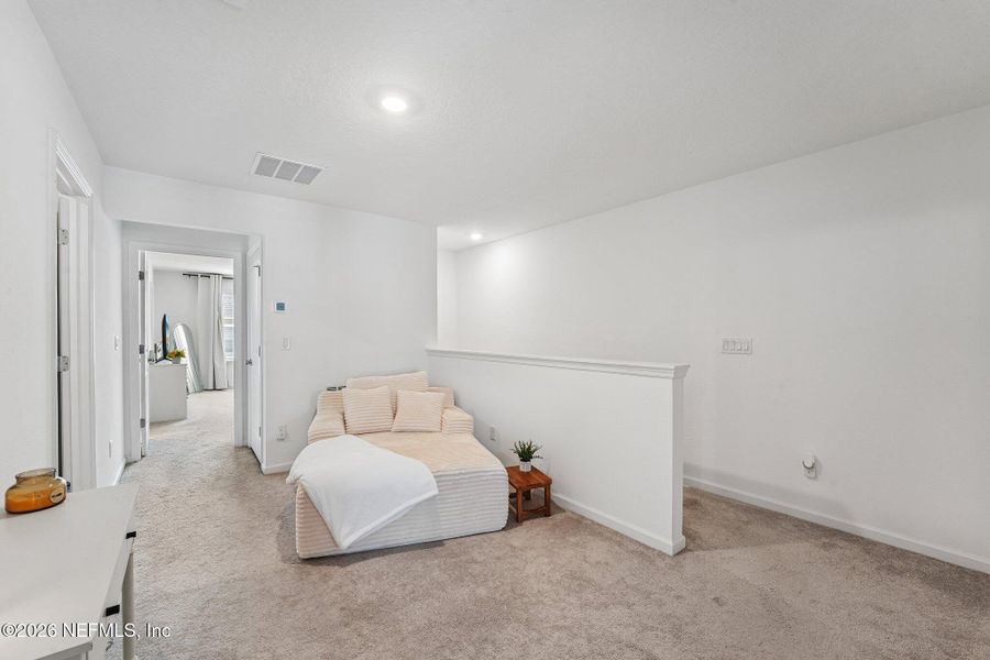 Furnished interior view inside a new home in Longbay Townhomes, Middleburg (Image 8).
