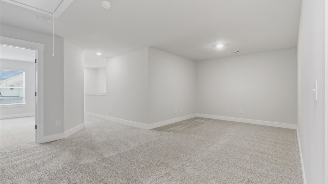 Furnished interior view inside a new home in Village at Midway, Anderson (Image 25).