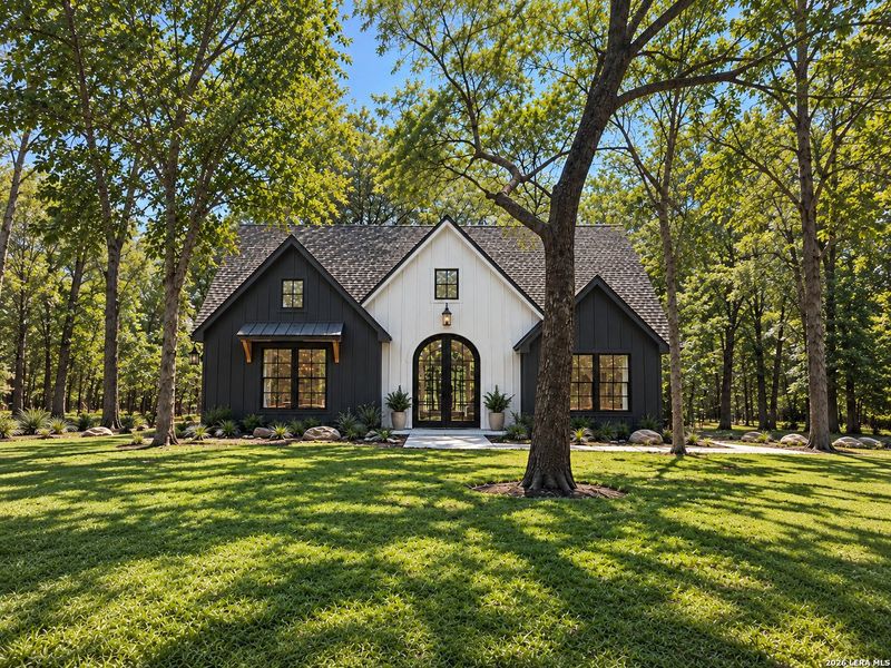 Front exterior of a new home in , Devine, TX, highlighting curb appeal (Image 1). Front exterior of a new home in , Devine, TX, highlighting curb appeal (Image 1).