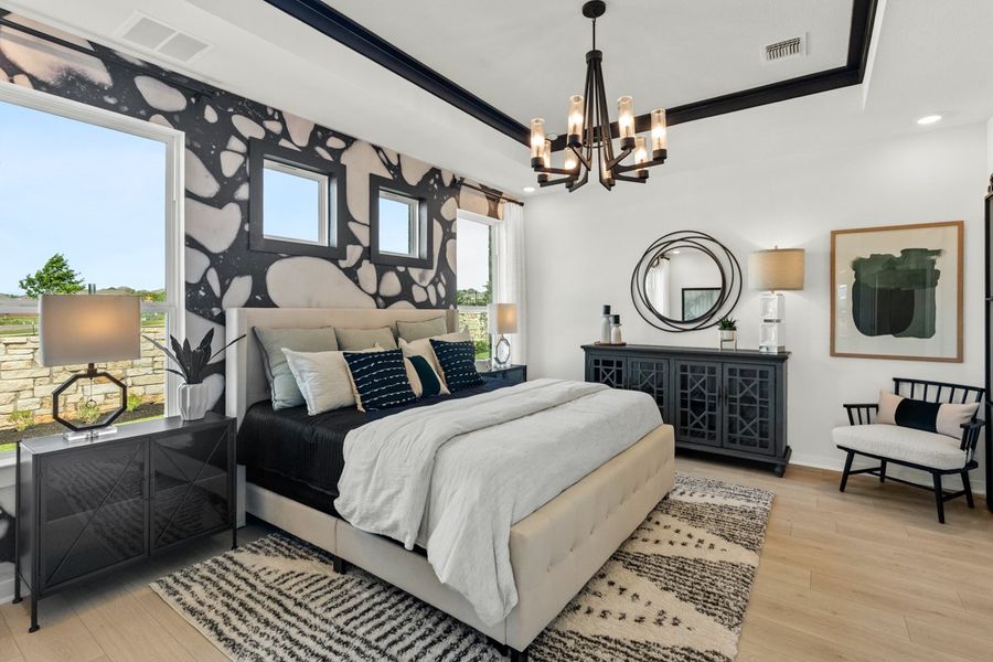 Representative furnished interior of a home built from the Peyton by Chesmar Homes in University Heights, Round Rock (Image 8).