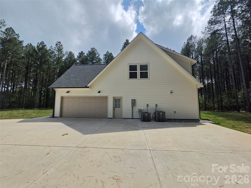 Front exterior of a new home in , Marshville, NC, highlighting curb appeal (Image 25). Front exterior of a new home in , Marshville, NC, highlighting curb appeal (Image 25).