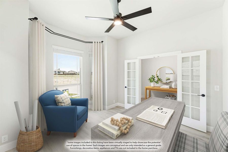 Home office with French doors, ceiling fan, wood desk, and blue accent chair on light hardwood floors