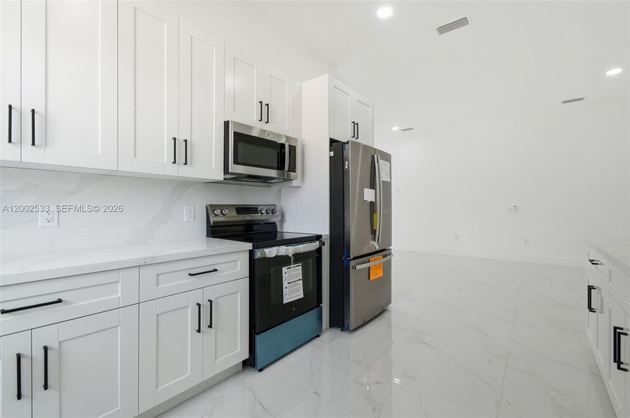 Furnished interior view inside a new home in , Lehigh Acres (Image 10).