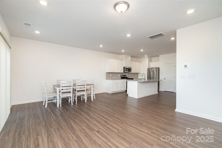 Living Room into Dining Area & Kitchen Living Room into Dining Area & Kitchen